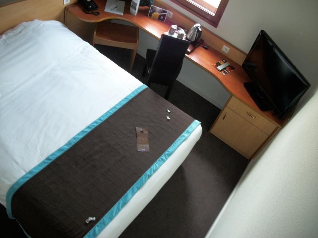 Kyriad Montpellier Aeroport - Parc Expo モーギオ 部屋 写真