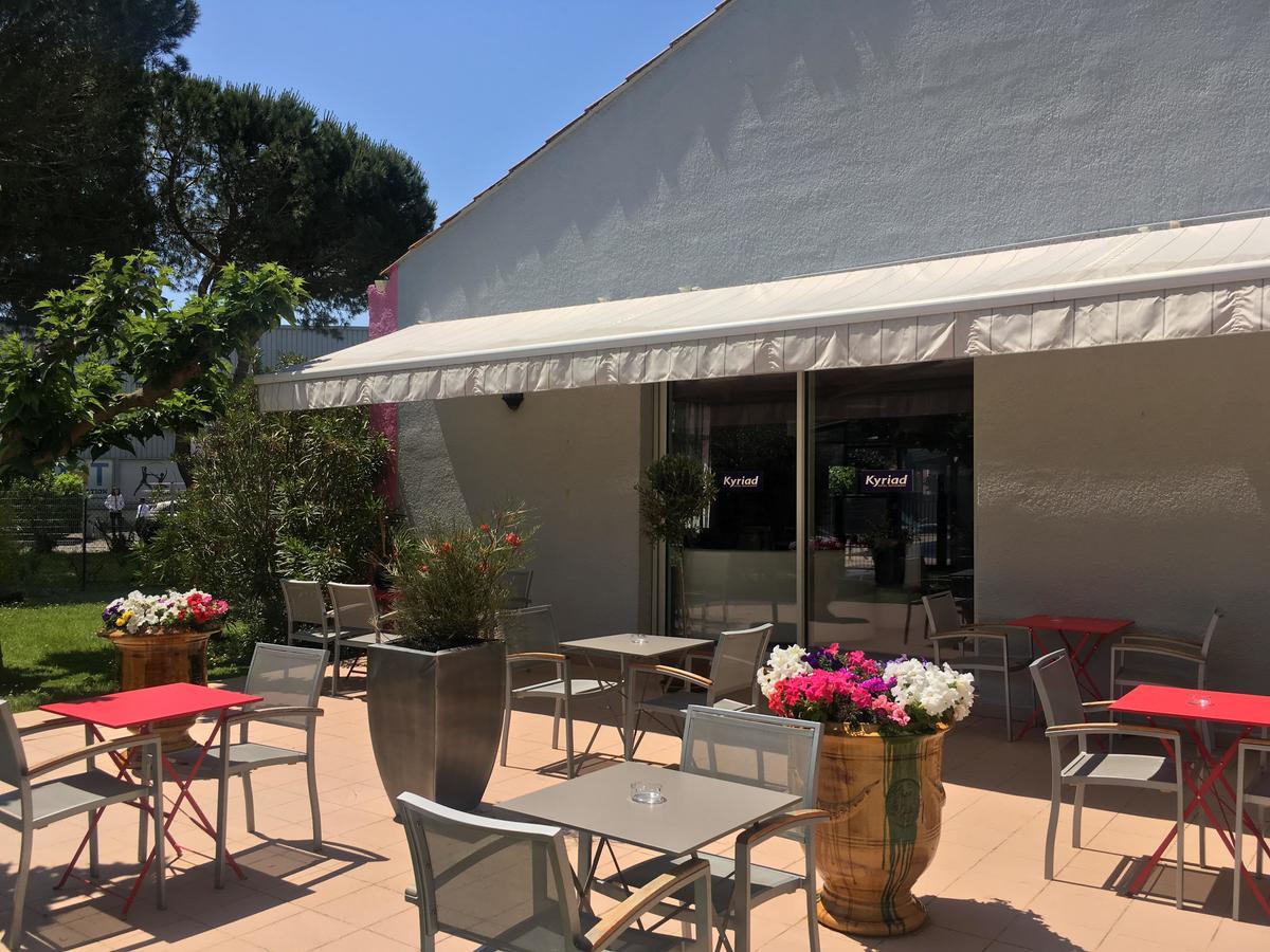 Kyriad Montpellier Aeroport - Parc Expo モーギオ エクステリア 写真